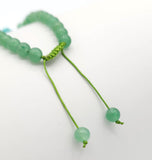 Turquoise Four Leaf Clover and Green Tangling Bead Bracelet